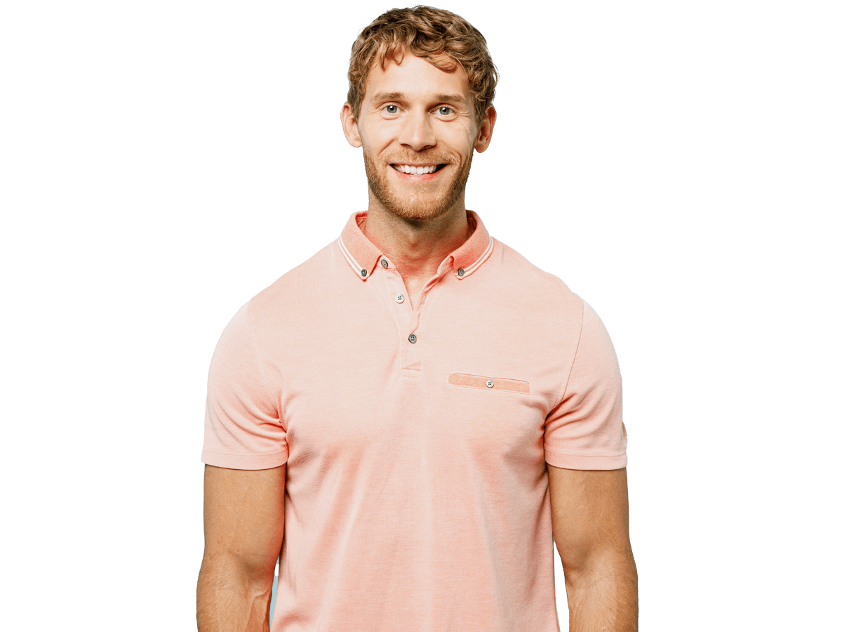 Gaelic scottish translation services professional wearing a pink polo shirt and smiling
