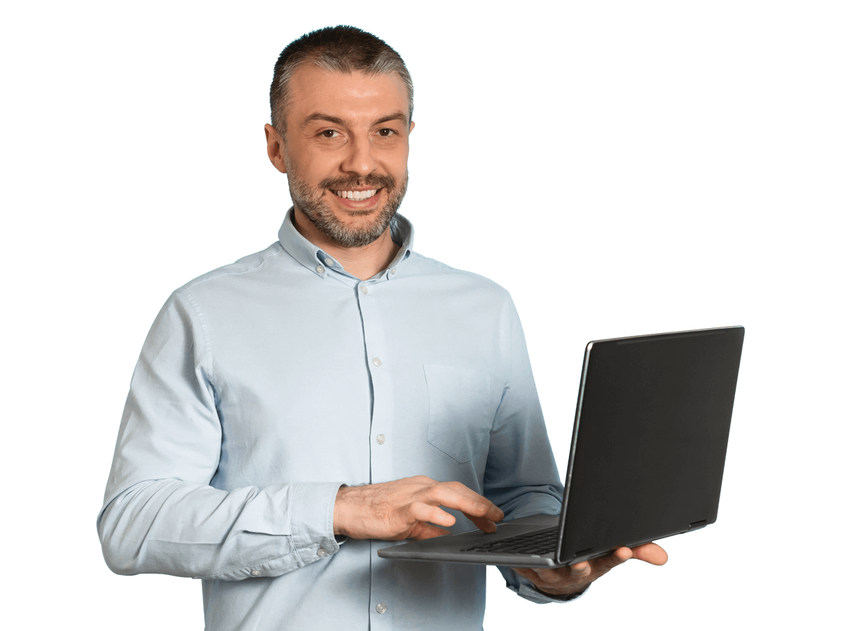 Greek website translation services man smiling holding a laptop 