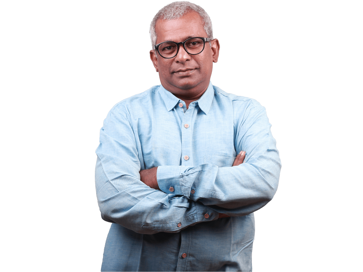 Kannada translation services, Portrait of a senior man of Indian ethnicity with a confident look