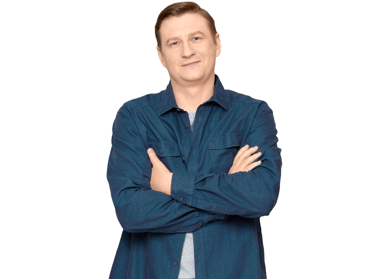 Lithuanian transcription services, Studio portrait of happy blond mature man wearing casual blue shirt,holding arms folded on chest