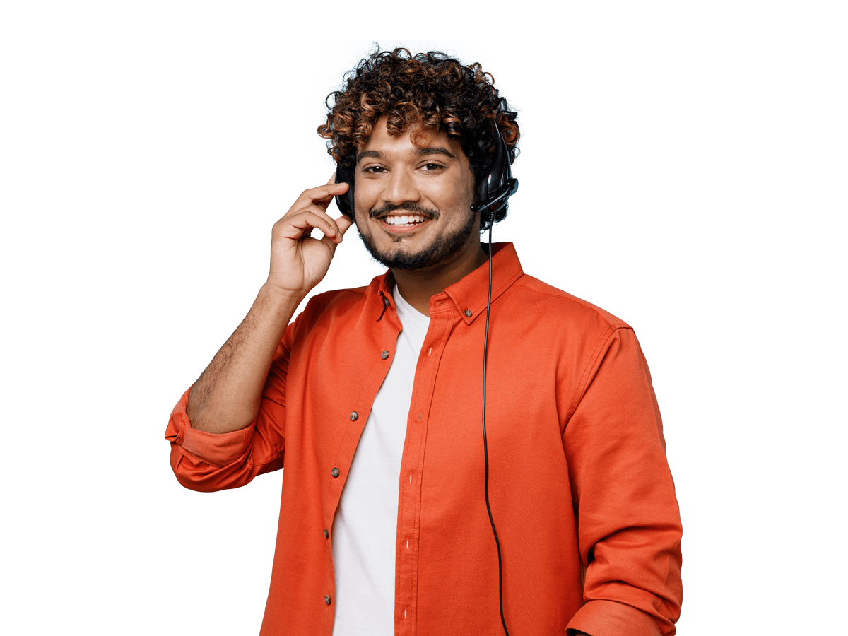 Marathi interpreting services man with curly hair wearing headphones