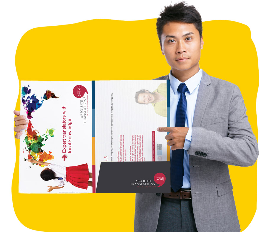 Brochure translator holding translated technical leaflet.