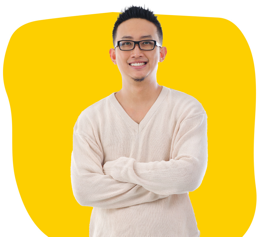 Tagalog Proofreading Company a young man smiling wearing a beige sweatshirt and arms crossed 