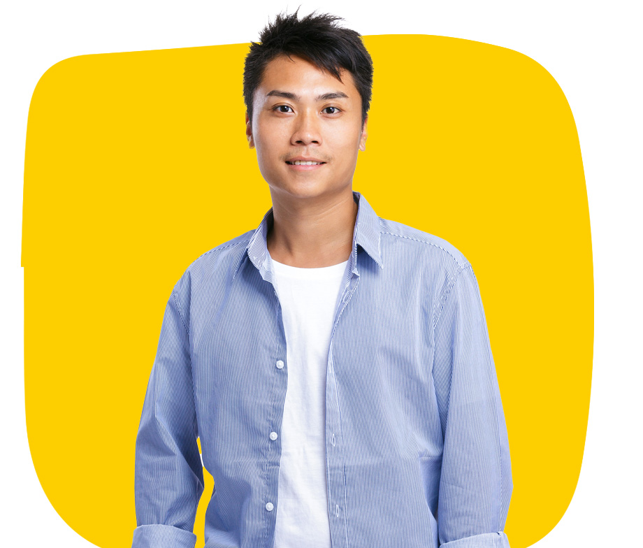 Tagalog Subtitling Service Professional confidently smiling wearing a blue shirt on a yellow background