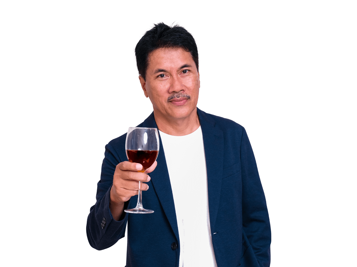 Wine translation services man holding a glass of red wine