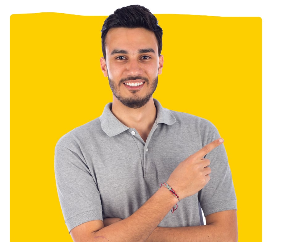 Young Egyptian translation specialist smiling and pointing wearing a grey shirt